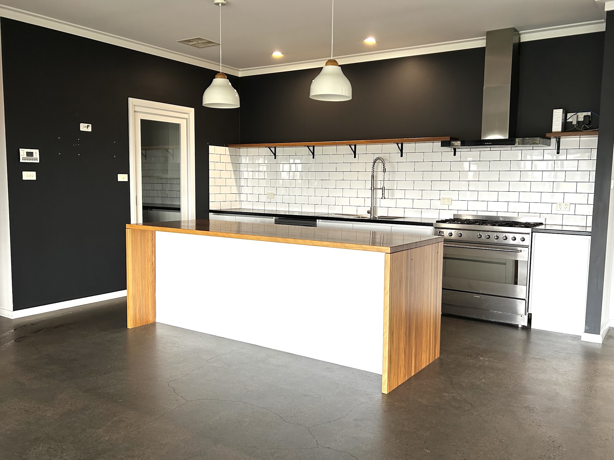 Clean kitchen and open living space following property cleaning